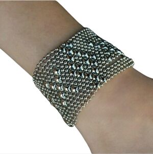 SG Liquid Metal Chrome Finish Hugs And Kisses Bracelet by Sergio Gutierrez